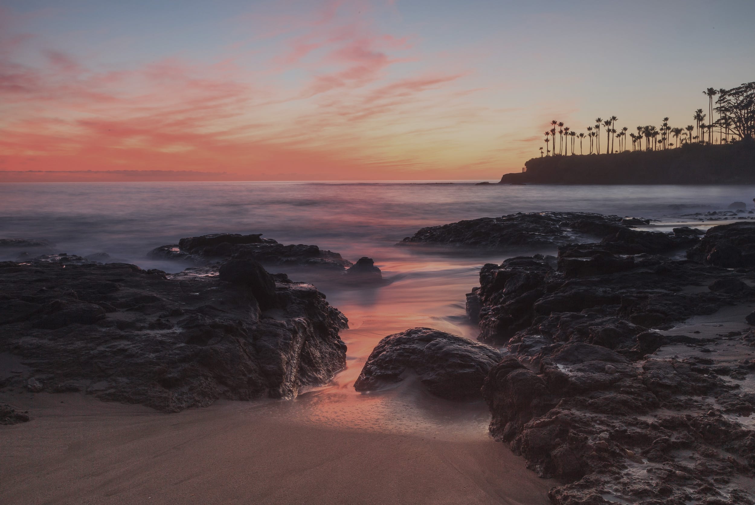 Coastal sunset image representing a premium financing estate liquidity case study