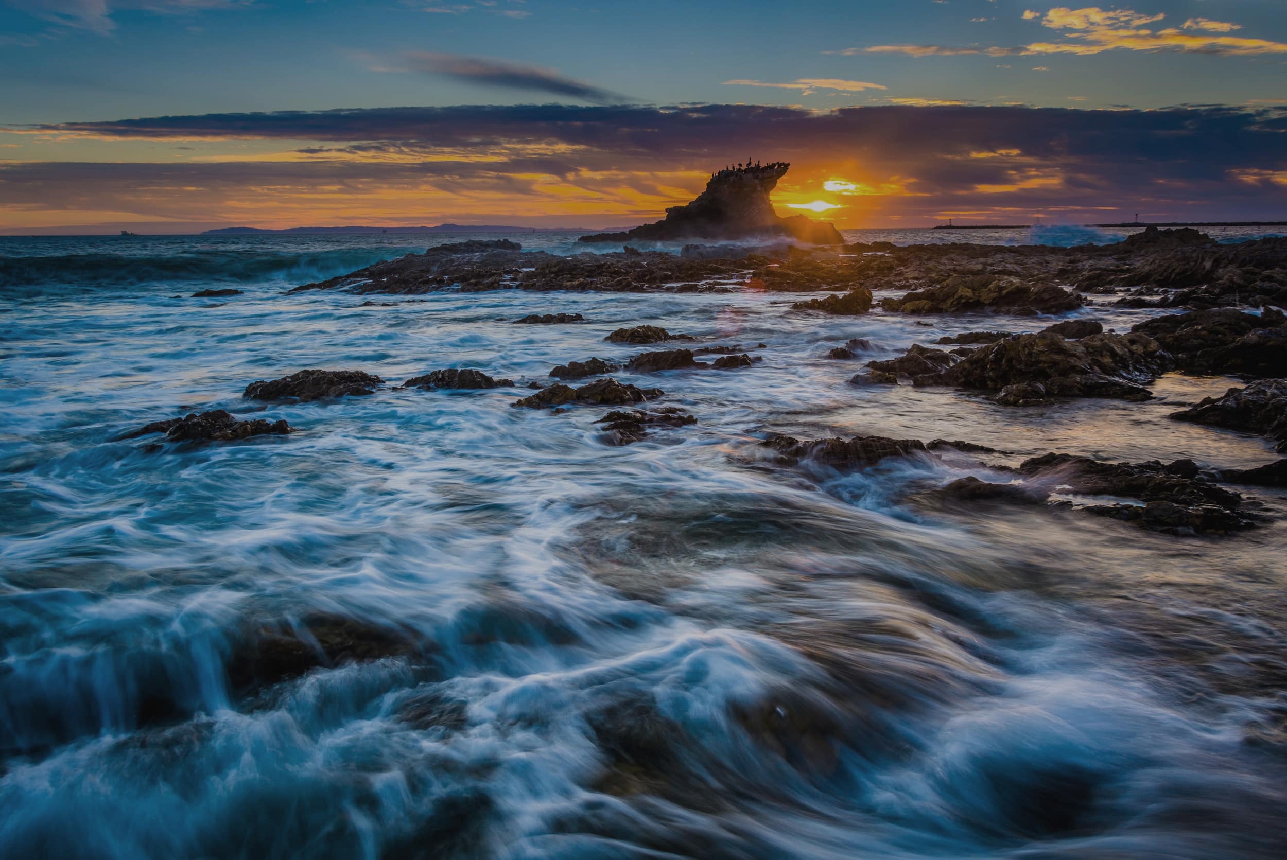 Ocean landscape representing premium financing versus paying cash for life insurance planning